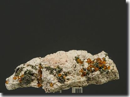 Spessartite Garnet on Feldspar from China